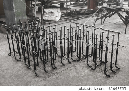 Metal anchor bolts for concrete construction structures, foundation on the background of the reinforcing workshop industrial enterprise Metal anchor bolts for concrete construction structures, foundation on the background of the reinforcing workshop industrial enterprise 81068765