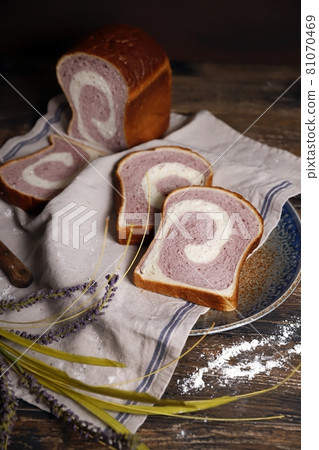 Sliced bread on rustic wooden table Sliced bread on rustic wooden table 81070469