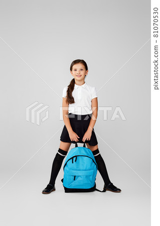 adorable schoolgirl with backpack. Back to school adorable schoolgirl with backpack. Back to school 81070530