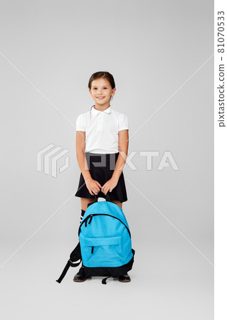adorable schoolgirl with backpack. Back to school 81070533