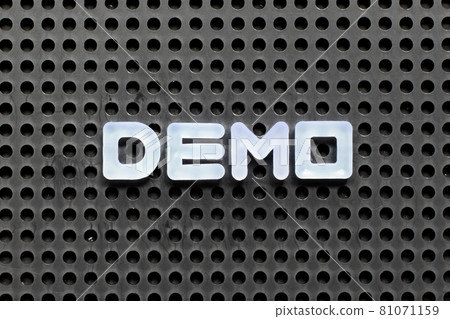 White color letter in word demo on black pegboard background White color letter in word demo on black pegboard background 81071159