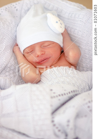 Sleeping newborn baby boy with funny hat. Babyface close-up. Very sweet infant. Sleeping newborn baby boy with funny hat. Babyface close-up. Very sweet infant. 81071603