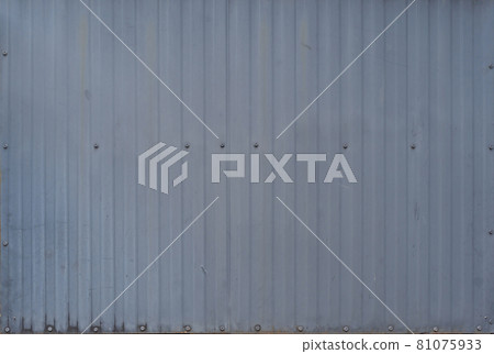 Metal steel strips. Rusty corrugated iron metal, Zinc steel wall, pattern texture background. Close-up of exterior architecture material for design decoration background. 81075933