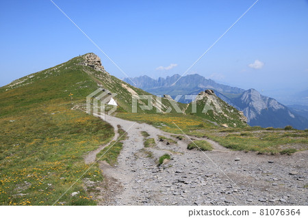 Hiking trail on a mountain ridge in the Pizol area, Switzerland. Hiking trail on a mountain ridge in the Pizol area, Switzerland. 81076364
