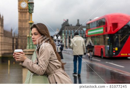 Woman Drinking Coffee on Westminster Bridge, Big Ben, London, England 81077245