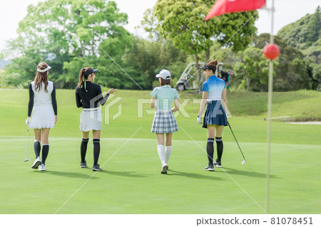 A woman enjoying golf A woman enjoying golf 81078451