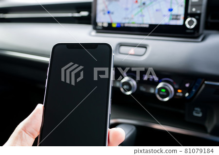 Watch your smartphone in a rainy car 81079184