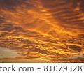 Burning clouds at sunset 81079328