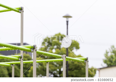 Jungle gym in the park on a rainy day Jungle gym in the park on a rainy day 81080652