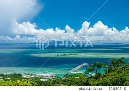 Stunning top view of a tropical island, amazing blue tones ocean at southern Japan. Stunning top view of a tropical island, amazing blue tones ocean at southern Japan. 81080848