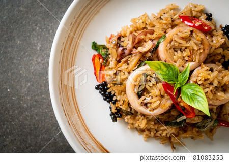 Basil and Spicy Herb Fried Rice with Squid or Octopus Basil and Spicy Herb Fried Rice with Squid or Octopus 81083253
