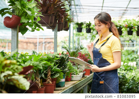 Flower Shop Owner Keeping Records Flower Shop Owner Keeping Records 81083895