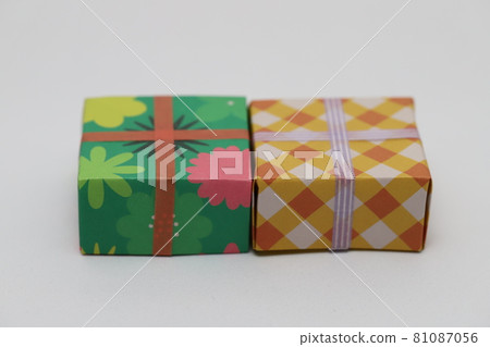 Two handmade colorful caskets made of origami Two handmade colorful caskets made of origami 81087056