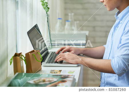 Man Working on Online Shop 81087260