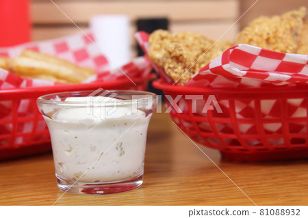 Fried Catfish With Tartar Sauce and French Fries in Cafe 81088932