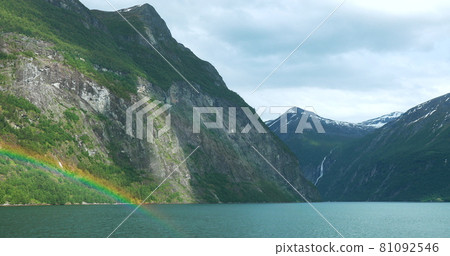 Sunnylvsfjorden, Norway. Colorful Rainbow Above Sunnylvsfjorden Spring Landscape. View From Floating Touristic Ship Ferry Boat In Summer Day. Famous Norwegian Landmark And Popular Destination 81092546