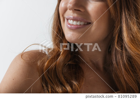 Close-up female lips with nude makeup. Concept of natural beauty, cosmetics, anti age treatment, wellness Close-up female lips with nude makeup. Concept of natural beauty, cosmetics, anti age treatment, wellness 81095289