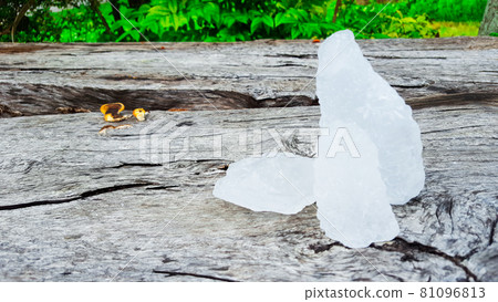 Alum on wood plank. Concept for body deodourant and vegetable preservation Alum on wood plank. Concept for body deodourant and vegetable preservation 81096813