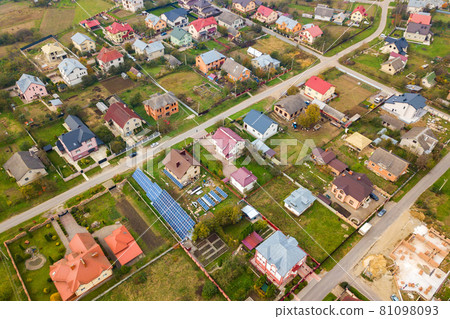 Aerial view of home roofs in residential rural neighborhood area. 81098093