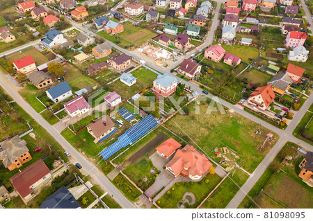 Aerial view of home roofs in residential rural neighborhood area. 81098095