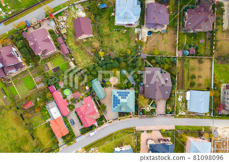 Aerial view of home roofs in residential rural neighborhood area. Aerial view of home roofs in residential rural neighborhood area. 81098096
