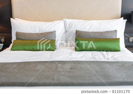 Modern bedroom with bed in a hotel Modern bedroom with bed in a hotel 81101170