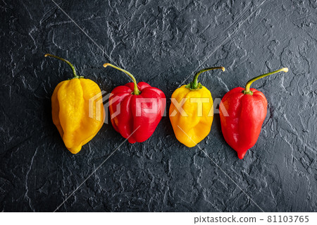 Yellow and red hot peppers jalapeno Yellow and red hot peppers jalapeno 81103765