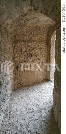 Ruined old fortress on the seashore. Blue sky. Architectural monument. Summer sea landscape. Ruined old fortress on the seashore. Blue sky. Architectural monument. Summer sea landscape. 81104599