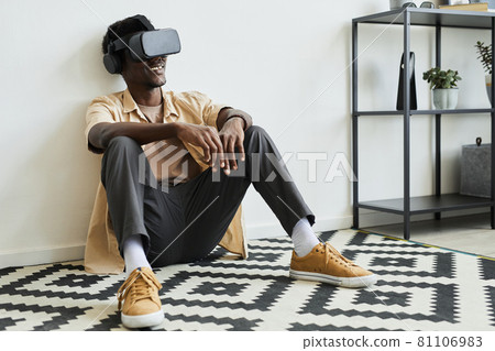 Man playing video game online Man playing video game online 81106983