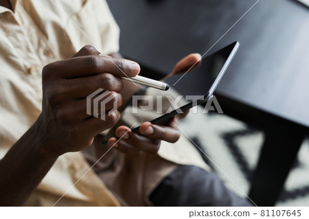 Man using digital tablet Man using digital tablet 81107645