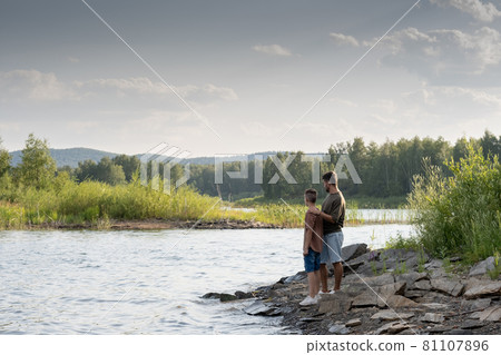 Idyl of father and son enjoying summer weekend by seaside Idyl of father and son enjoying summer weekend by seaside 81107896