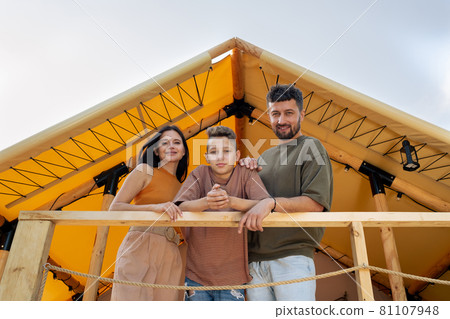 Contemporary family of three enjoying summer vacation Contemporary family of three enjoying summer vacation 81107948