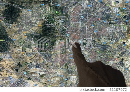 The city of Madrid in a satellite view The city of Madrid in a satellite view 81107972