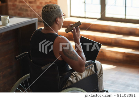 Modern Woman with Disability Using Gadgets Modern Woman with Disability Using Gadgets 81108081