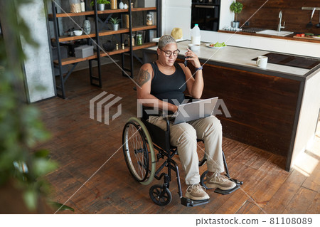 Modern Woman with Disability Working Modern Woman with Disability Working 81108089