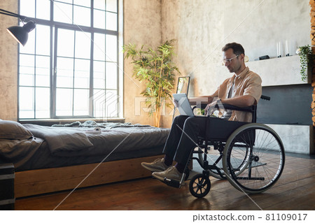 Modern Man with Disability at Home Modern Man with Disability at Home 81109017