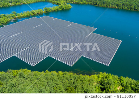 Panorama aerial view of floating solar panels cell platform on the beautiful lake renewable alternative electricity energy Panorama aerial view of floating solar panels cell platform on the beautiful lake renewable alternative electricity energy 81110057