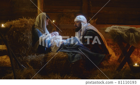 Joseph speaking with Mary after birth of Jesus 81110193