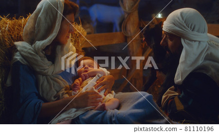 Joseph with lamb near Mary and baby Jesus 81110196
