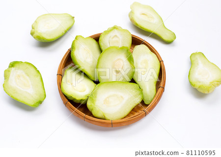 Fresh chayote fruit on white background. Fresh chayote fruit on white background. 81110595