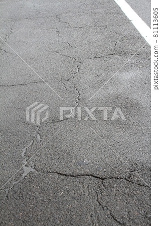 Cracks in asphalt on the road 81113605