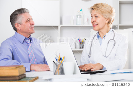 Mature man visits doctor Mature man visits doctor 81116240
