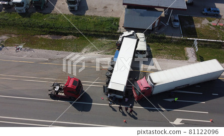 Top view of a car accident involving a truck and a bus. Filming from a drone Top view of a car accident involving a truck and a bus. Filming from a drone 81122096