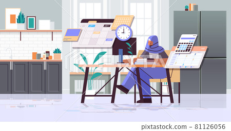 arab businesswoman at workplace planning day scheduling appointment time management concept arab businesswoman at workplace planning day scheduling appointment time management concept 81126056