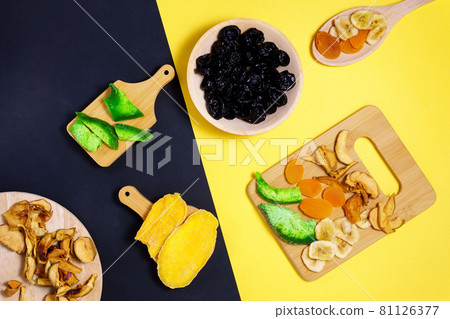 Mixture of dried fruits. Top view. Symbols of the Jewish holiday Tu Bishvat. 81126377