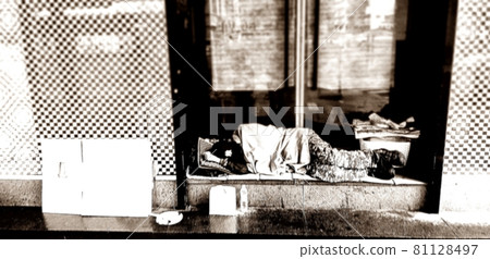 A homeless person sleeping in front of a building in Jongno 2-ga A homeless person sleeping in front of a building in Jongno 2-ga 81128497