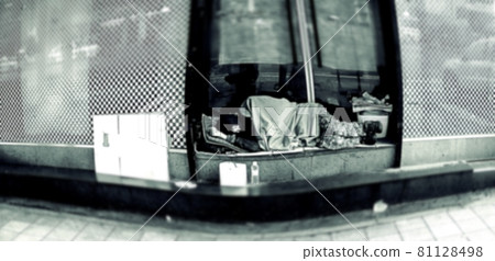 Homeless person sleeping in front of a building in Jongno 2-ga Homeless person sleeping in front of a building in Jongno 2-ga 81128498