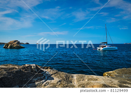 Yacht boat at Sarakiniko Beach in Aegean sea, Milos island , Greece 81129499