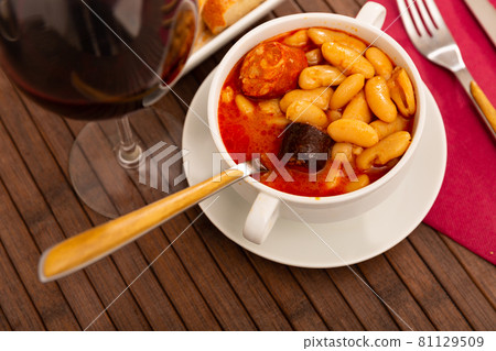 Traditional dish of Spanish cuisine is Fabada soup Traditional dish of Spanish cuisine is Fabada soup 81129509