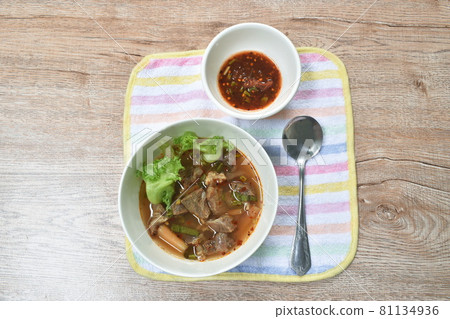 hot and spicy beef meat with tamarind and Thai herbs soup on bowl hot and spicy beef meat with tamarind and Thai herbs soup on bowl 81134936